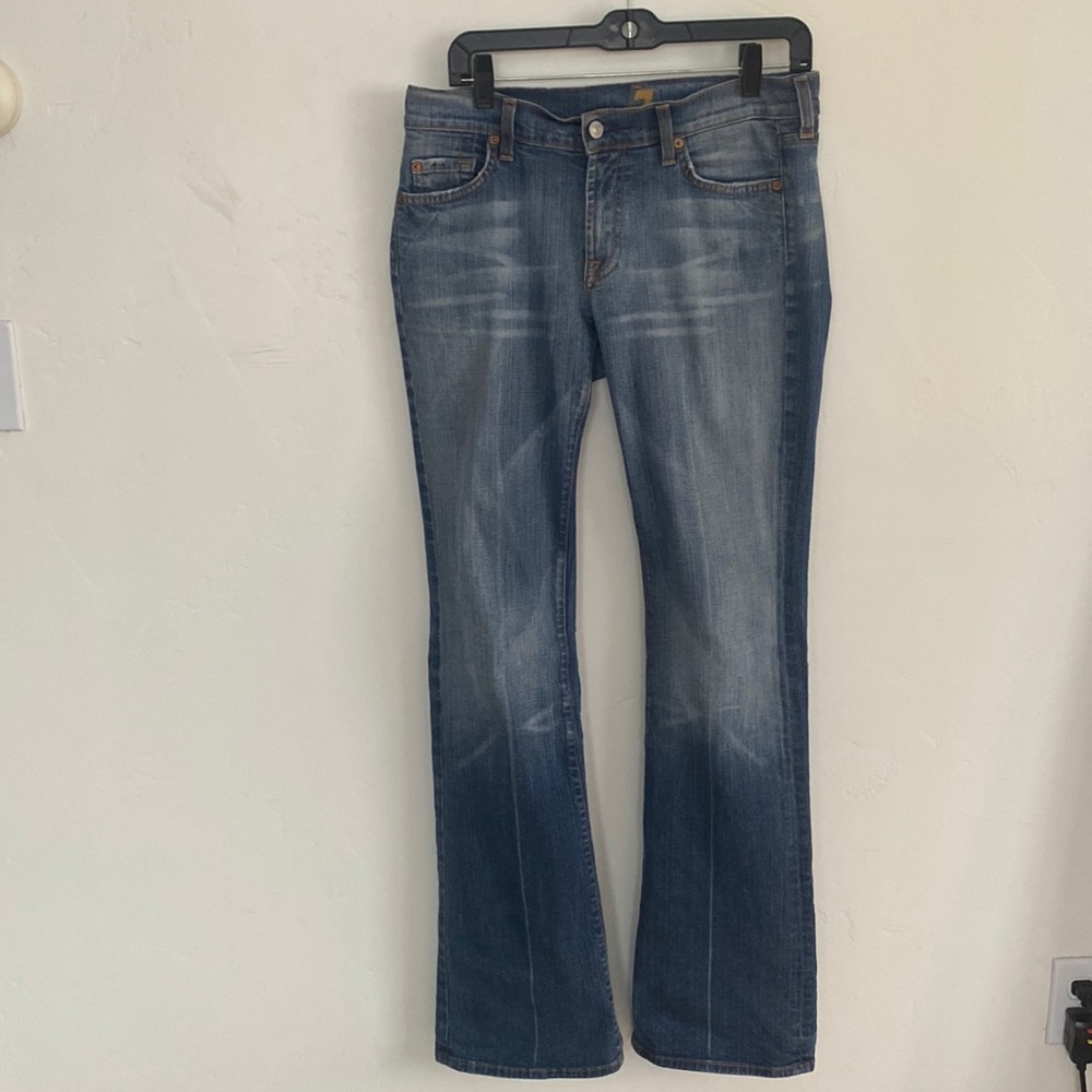 Two identical pair of 7 For All Mankind size 28 jeans.Cut #100895.Bootcut. Xcond
